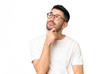 Young handsome caucasian man over isolated chroma key background having doubts