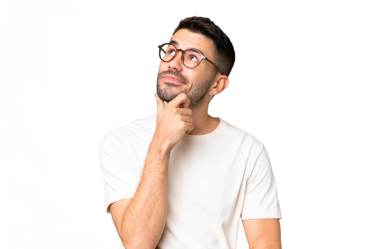 Young handsome caucasian man over isolated chroma key background having doubts