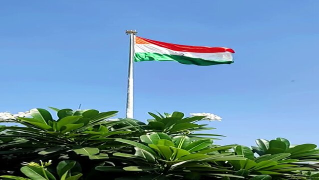 Indian flag waving in the air under the sky