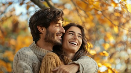 Fototapeta premium Embracing Autumn's Joy: Smiling Couple in Cozy Knit Sweaters Amidst Golden Leaves, Celebrating Love, Warmth, and Togetherness in Nature's Serene and Beautiful Setting