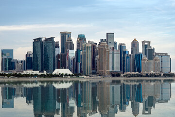 Fototapeta premium The Panoramic skyline of Doha, Qatar during sunset sunrise