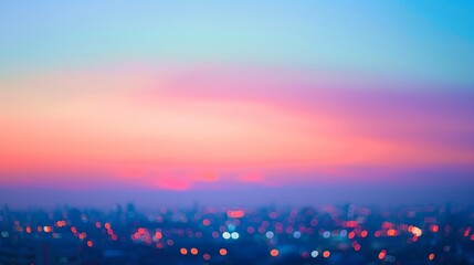 A soft focus on the twilight sky cityscape lights in the distance creating a dreamy spectrum of colors that eases the transition from day to night. .