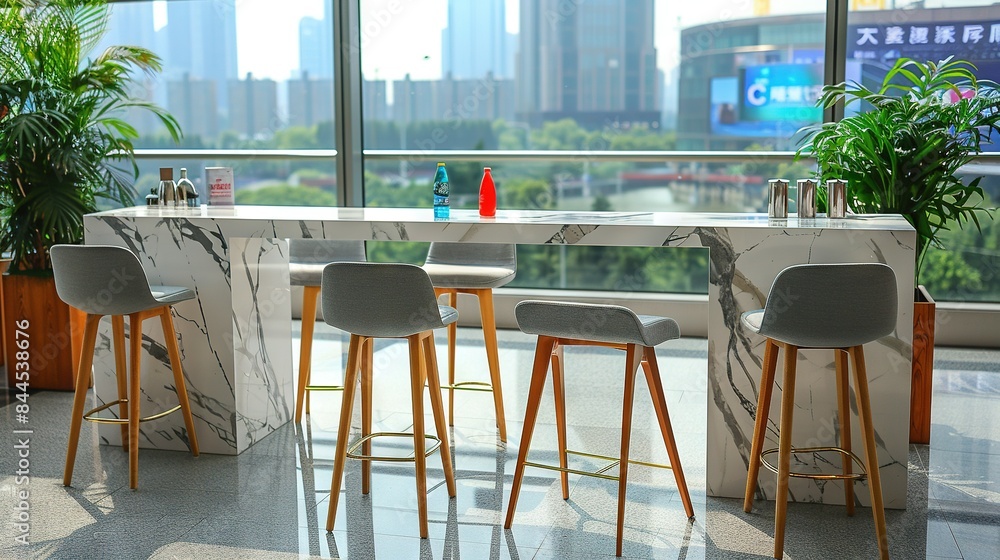 Poster three bar stools face a marble counter in a room with a large window that overlooks the city