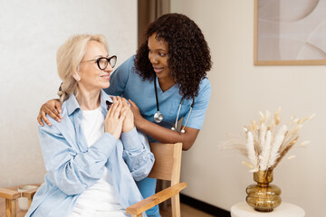 Nurse Providing Compassionate Care To Elderly Woman, Highlighting Support And Trust In Healthcare...