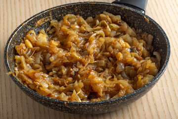 Skillet with fired onion.