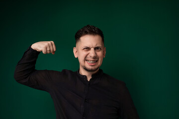 Man in Black Shirt Poses for Picture