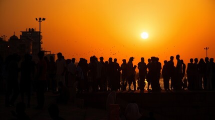 Fototapeta premium As the sun sets on the horizon blurred silhouettes of crowds and buildings transport the viewer to a time of fading memories and bittersweet nostalgia. .