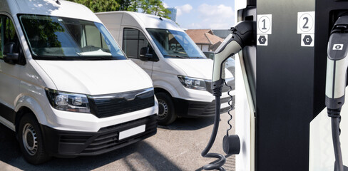 Electric delivery vans with electric vehicles charging station.