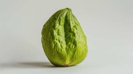 Fototapeta premium Chayote against a plain white backdrop