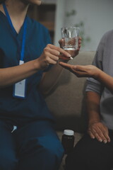 Doctors are giving advice on medication to patients in hospital examination rooms, treating diseases from specialists and providing targeted treatment. Concepts of medical treatment and specialists.