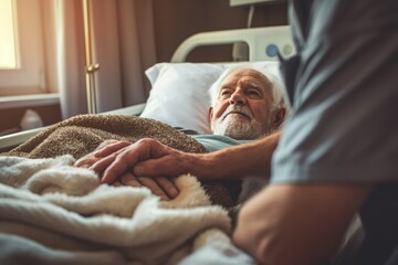 An elderly man patient lies in bed, a nurse carefully holds his hand. Cozy hospital room with soft lighting. Concept: calmness, hospital room, support, attentiveness, palliative care, hospice.