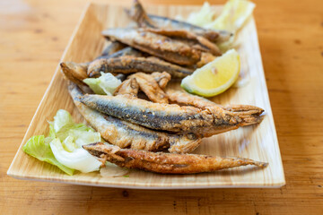 Small fried fish straight from the sea. A traditional, simple, delicious and healthy meal of Mediterranean cuisine
