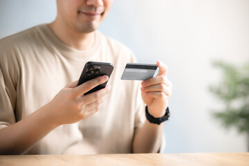 Mobile payment with wallet app technology. Digital money transfer, banking and e commerce concept. Man paying and shopping with smartphone application.