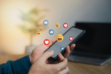 Social media and digital online concept, man using smart phone with Social media. The concept of living on vacation and playing social media. Social Distancing ,Working From Home concept.