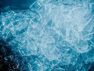Obraz premium icecubes background,icecubes texture,icecubes wallpaper,ice helps to feel refreshed and cool water from the icecubes helps the water refresh your life and feel good.ice drinks for refreshment business