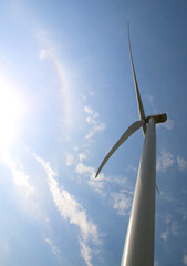 Wind generator in the rays of the sun. Ecological alternative energy.  