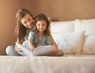 Girl, mom and happy with reading on bed with care, bonding and love with connection for learning in house. Storytelling, mother and daughter with book listening or teaching in bedroom at family home