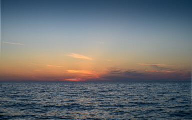 Naklejka premium beautiful colored sky at sunset on the Mediterranean coast on the island of Cyprus
