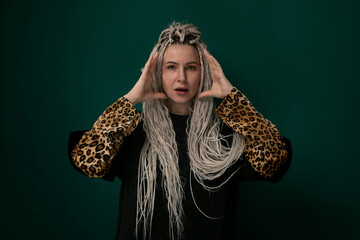 Woman With Long Hair and Leopard Print Scarf Covering Eyes