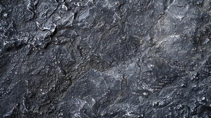 Naklejka premium dark gray rough grainy stone or sand plaster texture abstract background