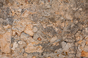 Ancient wall background with old concrete bricks
