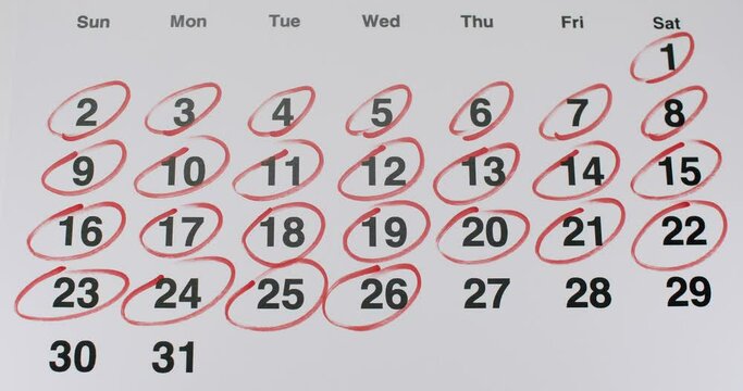 Image of a monthly calendar with weekends and important dates circled in red marker. Ideal for illustrating planning, scheduling, and organization concepts. Monthly Calendar Highlight