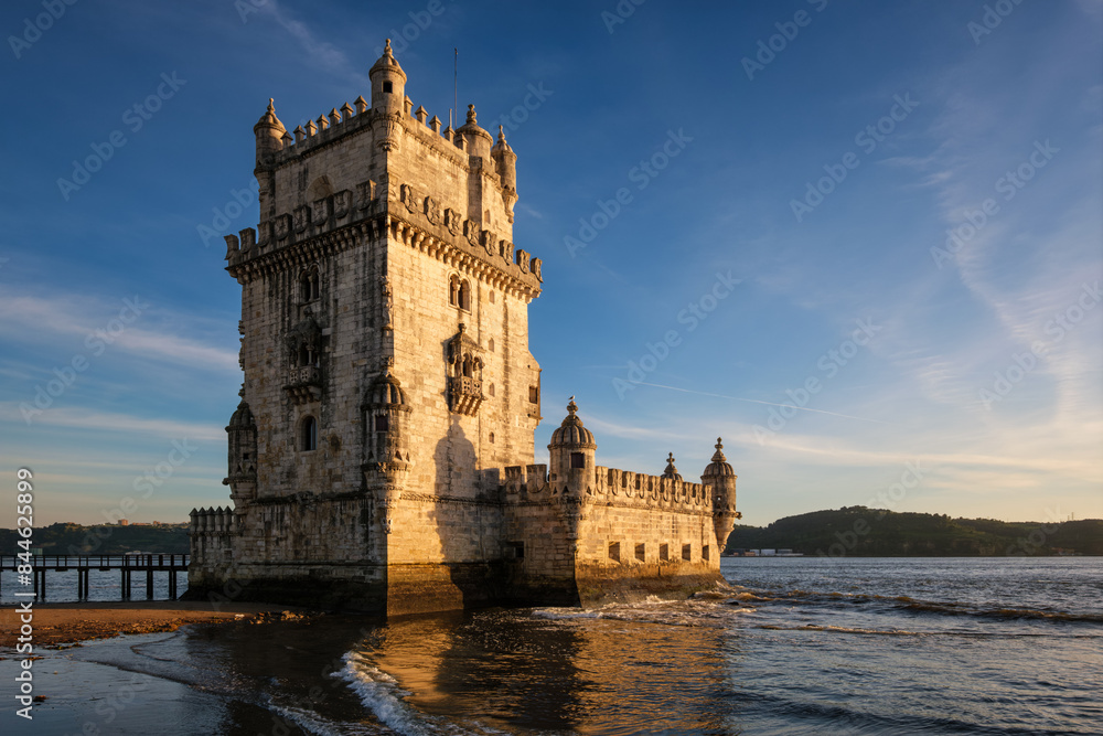 Wall mural belem tower or tower of st vincent - famous tourist landmark of lisboa and tourism attraction - on t