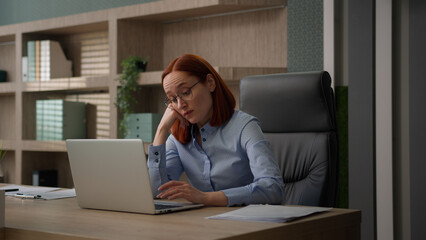 Bored sad Caucasian female office worker tired unmotivated business woman manager girl...