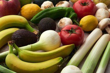 Fresh Produce Arrangement Featuring Red Apple, Tomatoes, and Leeks
