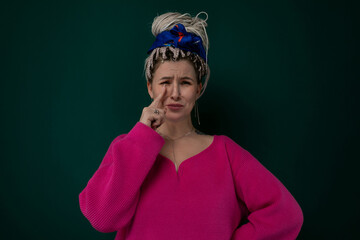 Woman in Pink Sweater Posing for Picture