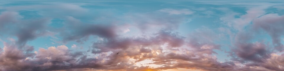 360 panorama of glowing sunset sky with bright pink Cumulus clouds. HDR 360 seamless spherical panorama. Full zenith or sky dome sky replacement for aerial drone panoramas. Climate and weather change.