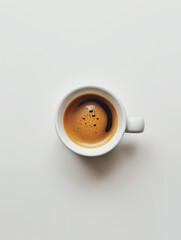 Photo of espresso in white cup on white background, minimalism