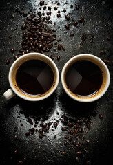 Two cups of coffee. Dark background with coffee beans. Banner, background, postcard. Copy space. Flat lay. Top view 