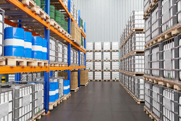 Warehouse inside. Barrels on storage racks. Plastic containers for liquids. Enterprise warehouse without anyone. Multi-tiered racks inside warehouse. Storage space. Logistics, fulfillment. 3d image