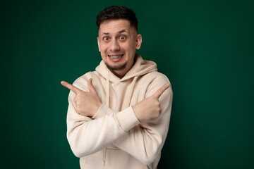 Man in a Hoodie Making a Gesture