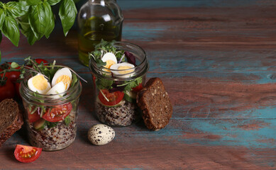 salad in a jar for lunch with vegetables and quinoa