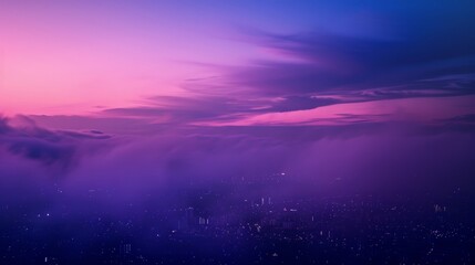 Fototapeta premium The defocused layers of deep purples and blues create a sense of enchantment as the sky fades into the distance highlighting the urban landscape below. .