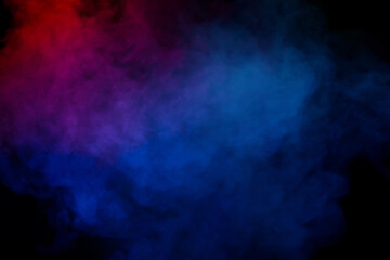 Blue and green steam on a black background.