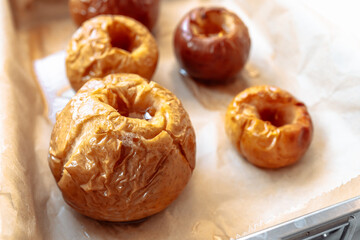 Baked apples in sugar syrup