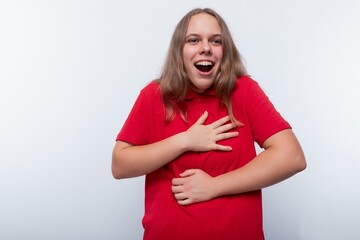 Funny girl with brown hair laughs loudly