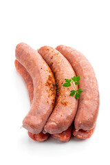 Set of raw spicy sausages isolated on white background