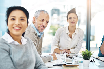 Portrait, mature man and manager with group in office meeting, about us and leadership in creative...