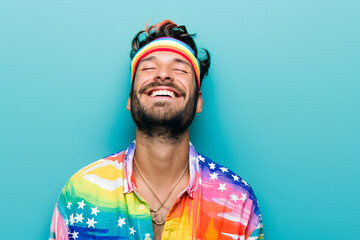 Fototapeta premium Portrait of gay man with rainbow headband. Happy pride month.