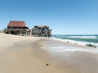 Typical Outer Banks beach cottages in exposed beach location