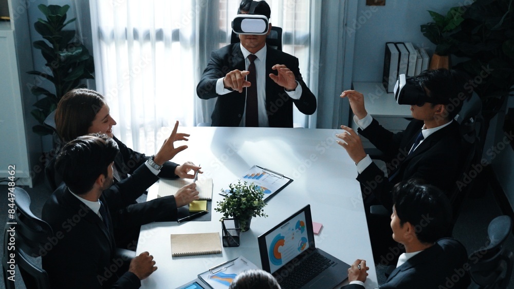 Poster top view of manager working on laptop and sending data analysis to business people by using vr glass