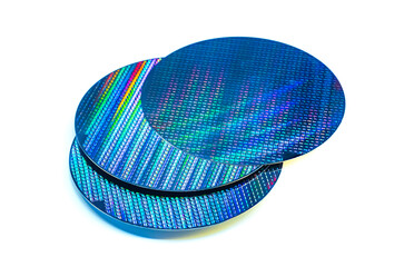 Silicon wafer with chips isolated on white background