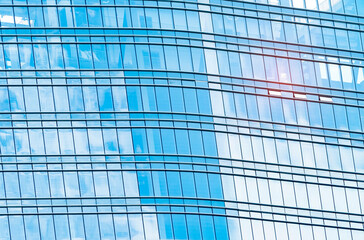 Contemporary office building blue glass wall detail