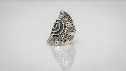 Tribal vintage silver ring on white background
