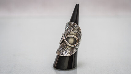 Tribal vintage silver ring on white background