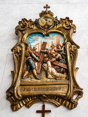 The intricate golden interior of the Carmelite church Igreja do Carmo in the old town of Faro in Portugal